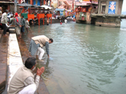 Collecting water from the Ganga